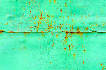 Texture of a metal wall with cracks and scratches which can be used as a background