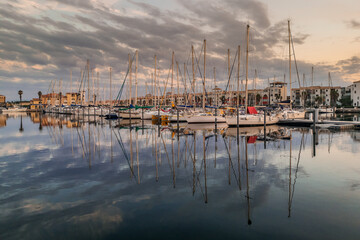 Ships and boats on a beautiful sunset taken in Port Leucate South of France a Mediterranean landscape