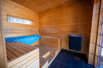 Fototapeta na wymiar Schwitzen in der Sauna in Skandinavien 