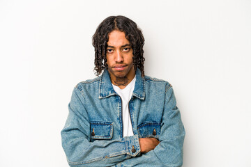 Young African American man isolated on white background unhappy looking in camera with sarcastic expression.