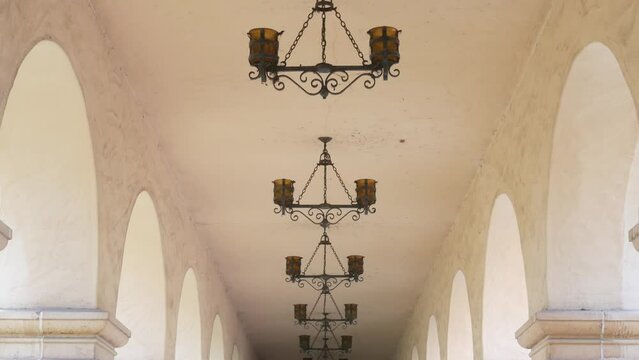 Spanish colonial revival architecture, Balboa Park, San Diego, California USA. Historic building, classic baroque or rococo romance style. Arches and columns of Casa, archway, vault, arcade or passage