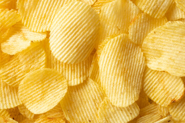 crispy golden potato chips snack texture background