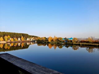 Fototapeta premium view from the villa by the lake on the autumn landscape
