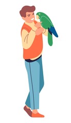 Man holding big green parrot. Guy talking with bird
