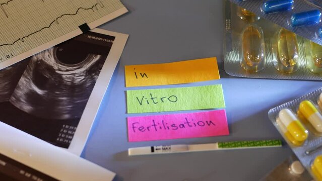 IVF or in vitro fertilisation, reproductive assisted technology, infertility or sterility treatment. Ultrasound or ultrasonography, pregnancy test, syringe and pills. Hormonal drugs for stimulation.