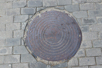 manhole cover in the street