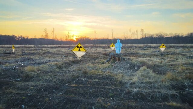 Virologist wearing white hazard protective suite and gas mask standing in desolate contaminated land after Nuclear explosion radiation accident and Biological weapons