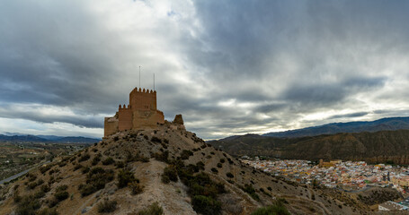 view of the Moorish castle and village of Tabernas in the desert of Andalusia