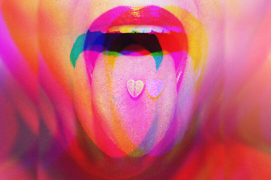Woman with psychoactive drug pills on her tongue having psychedelic trip with hallucinations