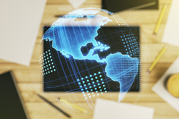 Digital America map and modern digital tablet on background, top view, international trading...