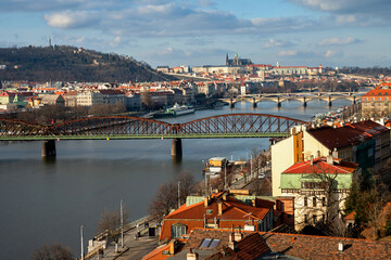 Panorama Prague with river Vltava and railway bridge.