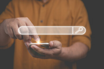 Businessman touching at a smartphone to the searching website for information on black background. Data Search Technology Search Engine Optimization. Use Search Console with your website.
