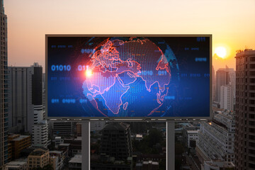 Glowing hologram of Earth planet map on billboard over aerial panoramic cityscape of Bangkok at sunset. The concept of international business in Southeast Asia.