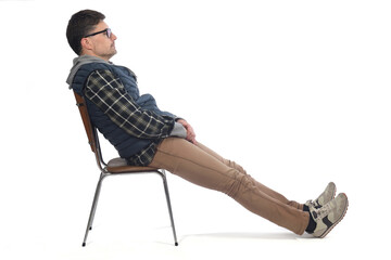 man relaxed on a chair on white background
