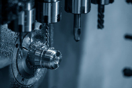 The multi-tasking CNC lathe machine swiss type tapping  the pipe connector parts.