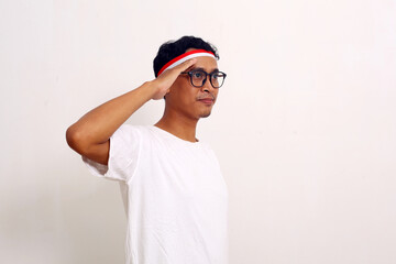 Asian man celebrating independence day while standing and showing respect gesture