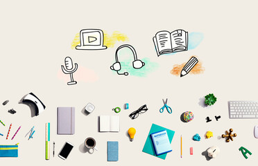 E-Learning concept with collection of electronic gadgets and office supplies