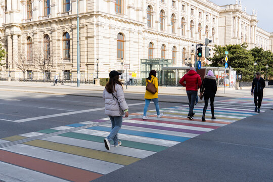 People Crossing The Rainbow Flag Zebra Crossing In Vienna