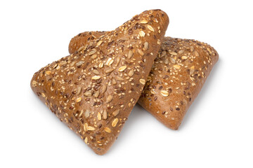 Pair of fresh multi grain triangle buns close up isolated on white background 