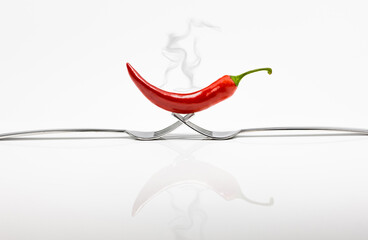 red hot chili pepper on a fork