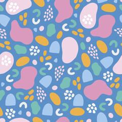 Abstract seamless pattern with colorful geometric shapes on blue background