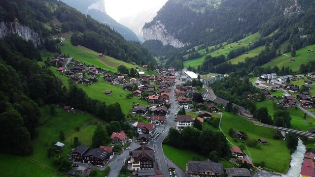 Lauterbrunnen townscape and waterfall drone aerial view above swiss mountains in alps.Tourist destination. Travel Europe.