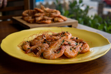 shrimp - tasty fried pink prawns served on a plate