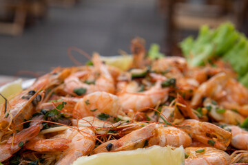 shrimp - tasty fried pink prawns served on a plate