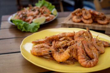 shrimp - tasty fried pink prawns served on a plate