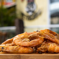 shrimp - tasty fried pink prawns served on a plate