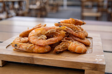 shrimp - tasty fried pink prawns served on a plate