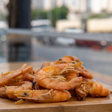 shrimp - tasty fried pink prawns served on a plate