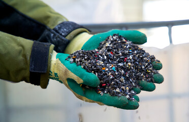 Close up of granulated plastic waste on a recycling plant for plastics