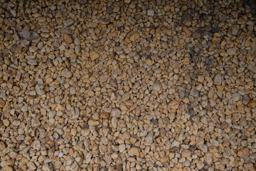 Natural small brown stones for design.