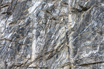 Marble surface with veins and a beautiful pattern on an industrial quarry. Karelia. Russia