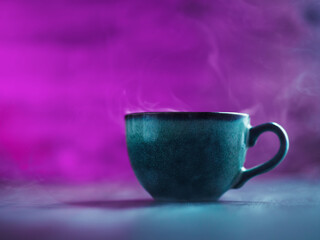 Fototapeta premium Coffee cup smoke, purple dark background copy space