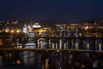 evening view of the historical center of Prague and the Vltava bridges