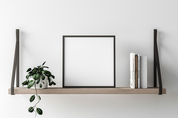 Interior wall mockup in minimalist style with trailing green plant and frame, books, decoration on wooden shaelf on empty white wall background. Close up view, 3d rendering, 3d illustration