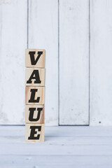 value word or concept on wooden blocks, white wood background