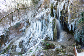 Fototapeta na wymiar Frozen waterfall in the winter