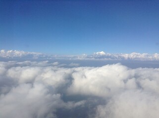 Fototapeta premium the Himalayas viewed from above the clouds