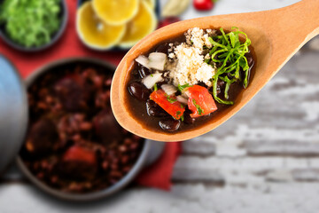 Feijoada dish of typical Brazilian food Top view