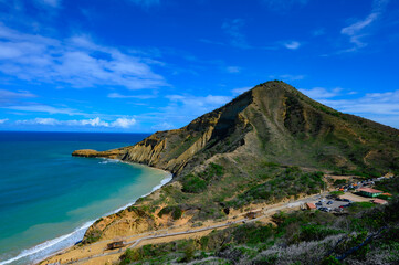 High mountain by the ocean in the Dominican Republic. Blue sky with clouds