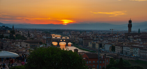 Fototapeta na wymiar Sunset bridges in Florence Italy