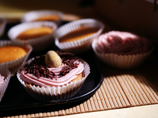 Home baked cupcake decorated with pink frosting 