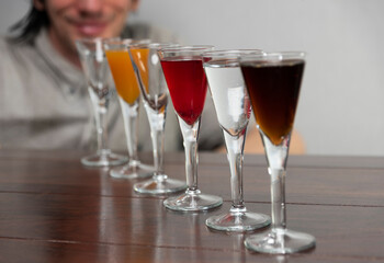 Coctail alcohol drinks on wooden brown table
