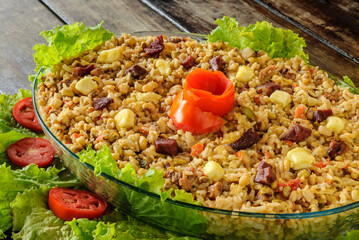 Rubacao, a traditional dish from the northeast of Brazil, made with beans, rice, sun-dried meat and...