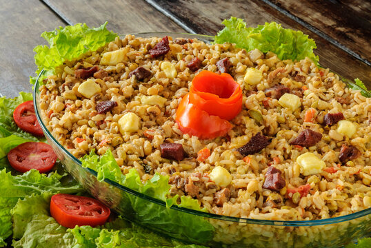 Rubacao, a traditional dish from the northeast of Brazil, made with beans, rice, sun-dried meat and rennet cheese. Brazilian food.