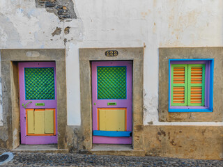 Fototapeta na wymiar Funny colorful doors in old town of Funchal, Madeira island