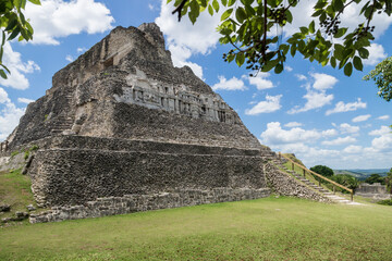 Maya pyramid ruin 'El Castillo' with carvings at the archeological site Xunantunich near San Ignacio, Belize